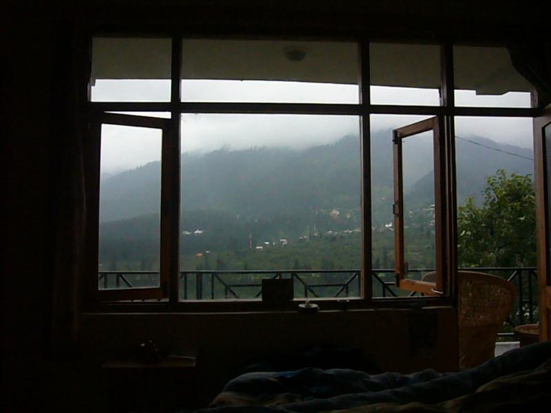 Didi's Guesthouse and the view of the cloud covered valley
